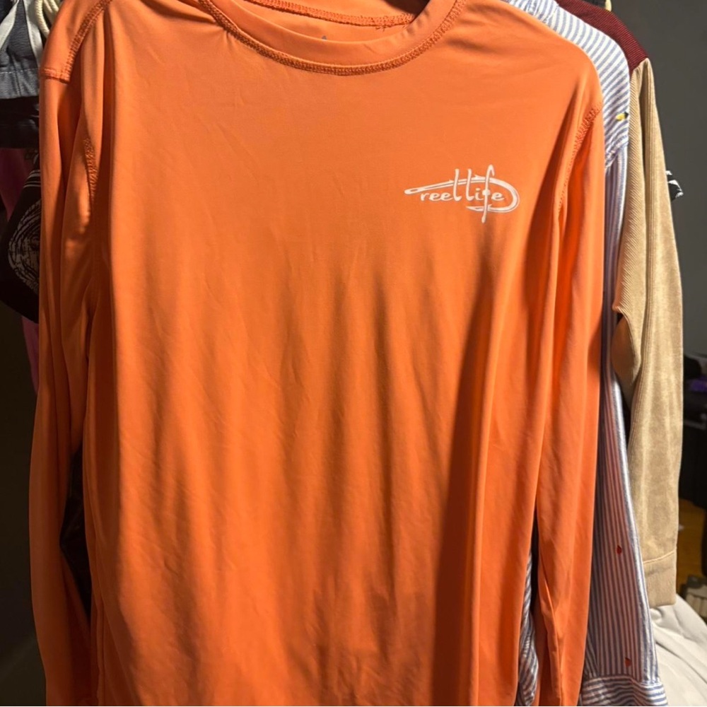Orange long sleeve Reel Life fishing swim shirt
